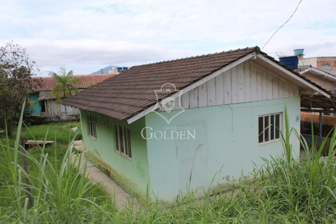 TERRENO COM CASA — 2